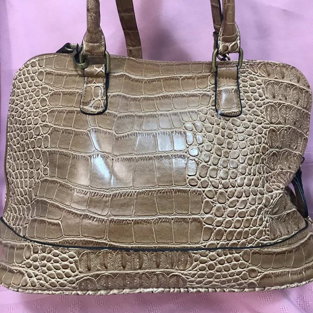 Tan Purse only used once in great condition.